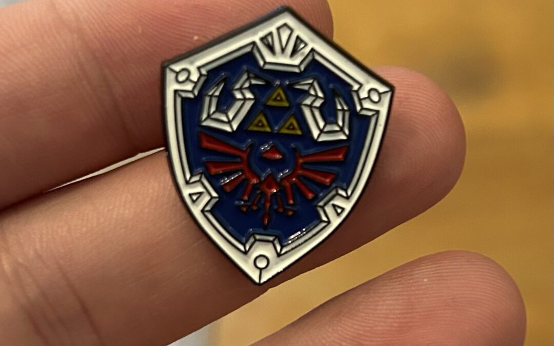 Defend Hyrule in Style: The Legend of Zelda Hylian Shield Enamel Pin